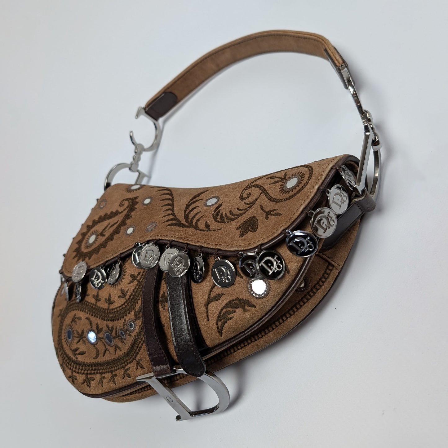 Saddle decorated with Dior pieces by Galliano