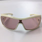 Pink and white Christian Dior sunglasses.