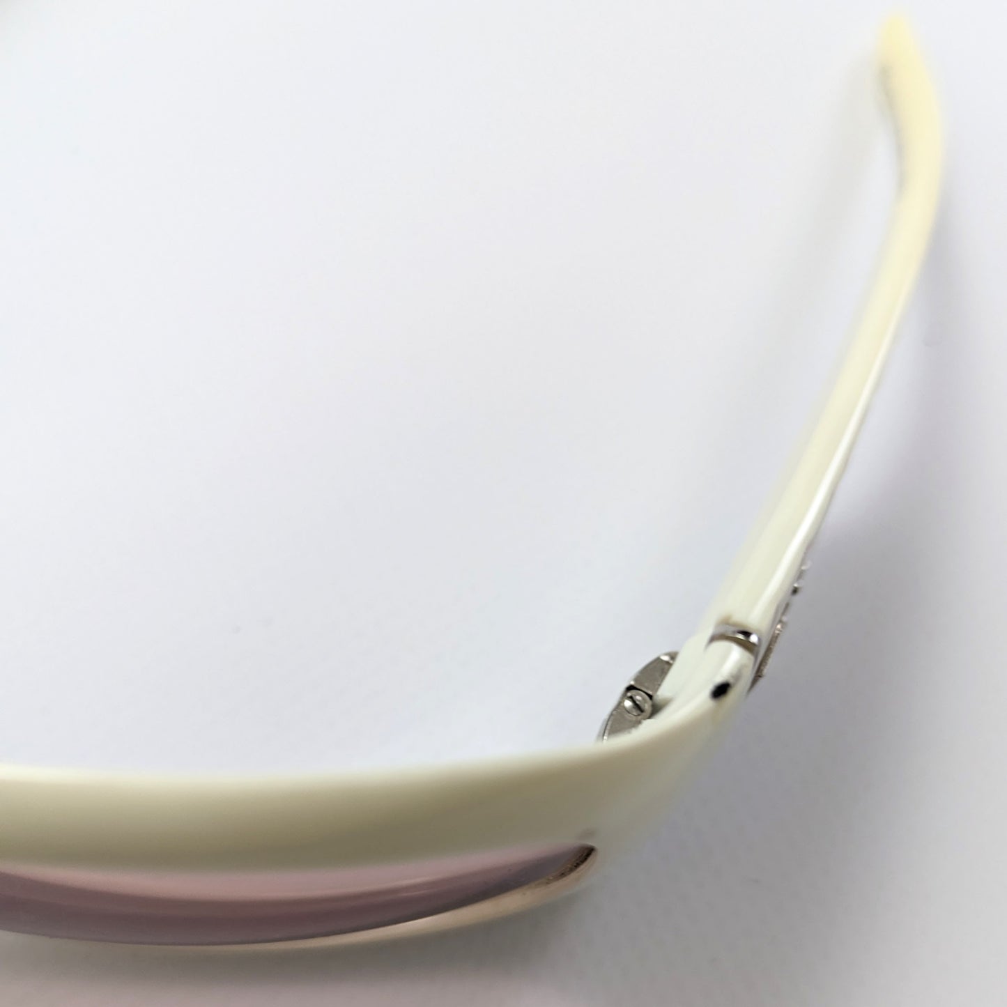 Pink and white Christian Dior sunglasses.